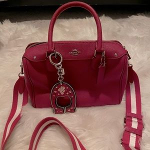 Red Coach Bag with Adjustable Strap and Bag Charm